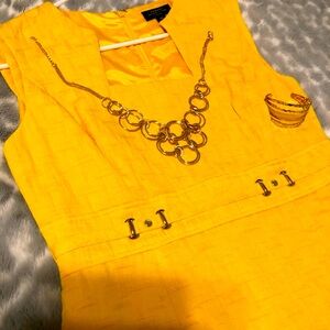 Tahari career dress gorgeous yellow a bit contemporary w/ the sharp features♥️